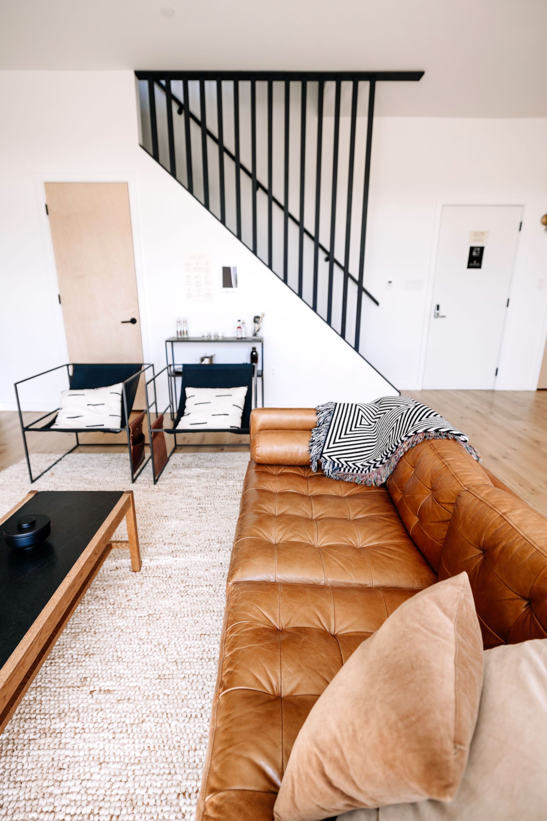 Bright and elegant contemporary loft with stylish decor and comfortable seating.